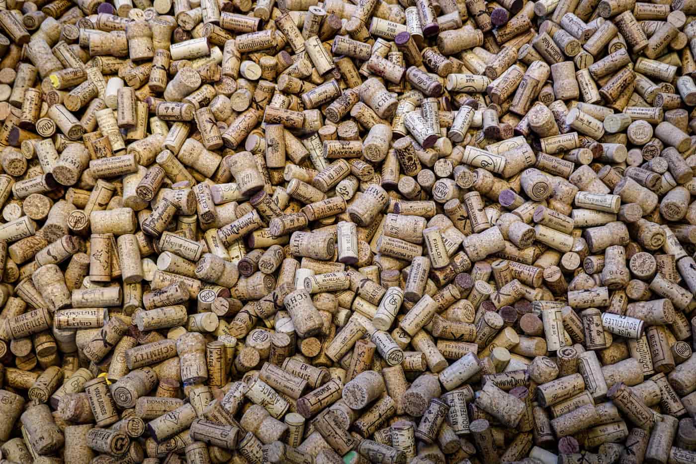 An overhead view of many corks forming a dense texture